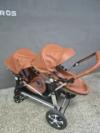 Cochecito gemelar marrón