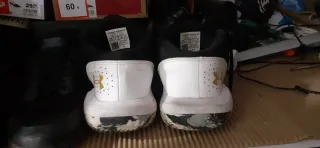 Zapatillas Under Armour Blancas y Doradas