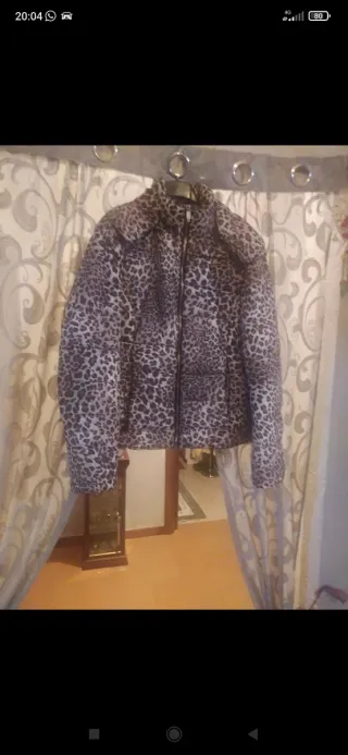 Piumino leopardato taglia L