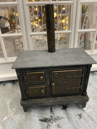 Cocina de leña para casa de muñecas