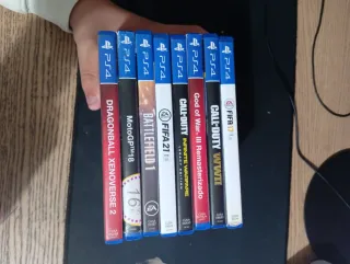 PS4 Slim Sony Negra mando y 8 juegos