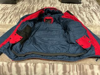 Chaqueta de esquí TROLLKIDS roja y azul.164 cm