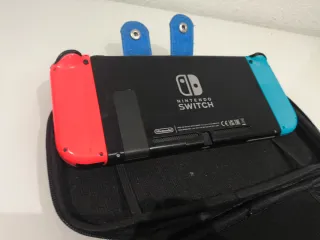 Nintendo Switch Cargador y Funda Roja