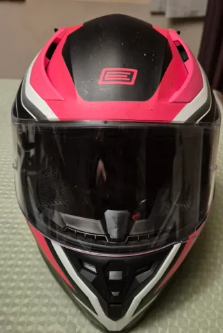Casco de moto integral rosa y negro