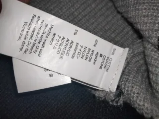 Pullover donna girocollo a righe manica lunga.