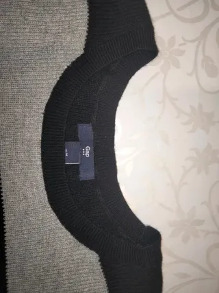 Pullover donna girocollo a righe manica lunga.