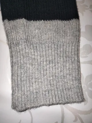 Pullover donna girocollo a righe manica lunga.