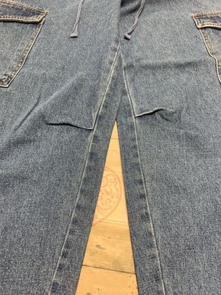 Calças ganga largas com bolsos