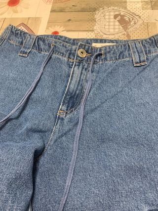 Calças ganga largas com bolsos