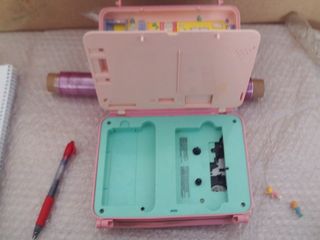 juguete pollypocker disco casette ribbon eater de