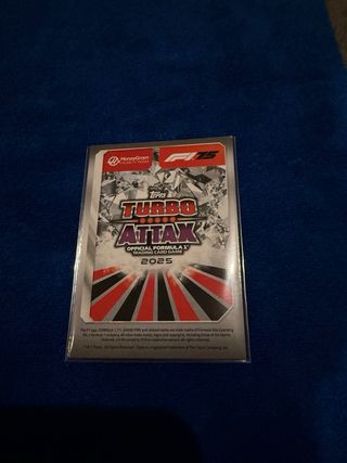 Carta Esteban Ocon Topps Amethyst con funda