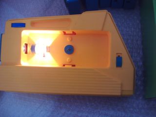 juguete cine exin super amarillo o narnaja + 5 pel