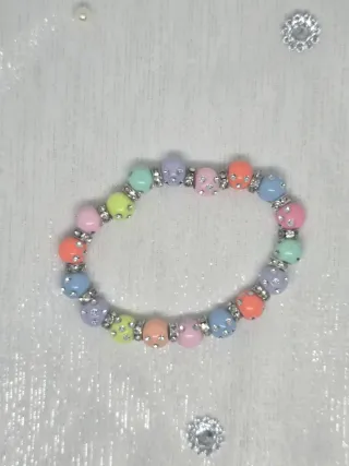 Pulsera elástica multicolor hecha a mano