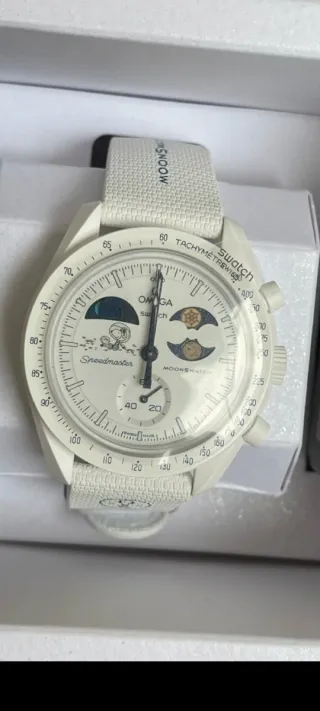 Omega x Swatch Misión Tierra Moonshine Oro