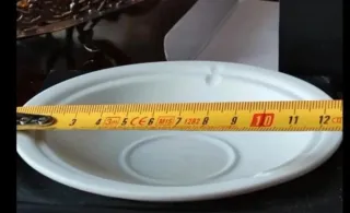 Porta candela in ceramica bianca con candela