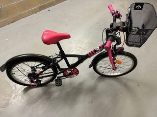 Bicicleta infantil rosa y negra
