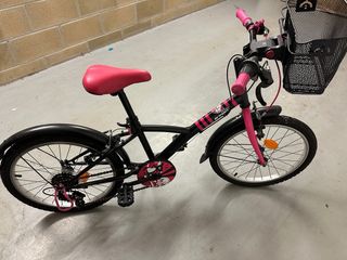 Bicicleta infantil rosa y negra