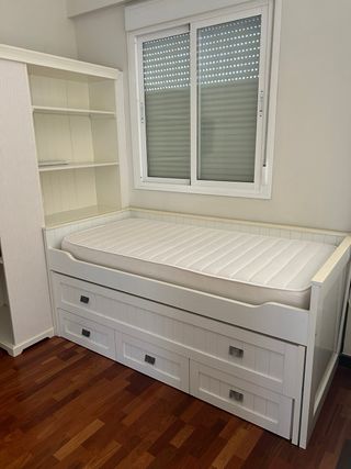 Dormitorio con cama nido