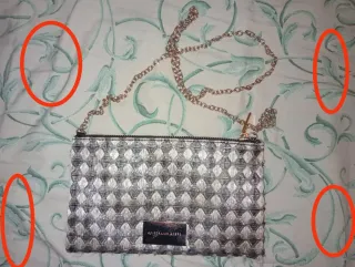 Bolso de fiesta dorado y negro