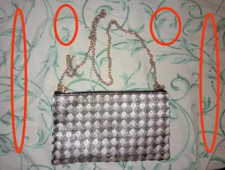 Bolso de fiesta dorado y negro