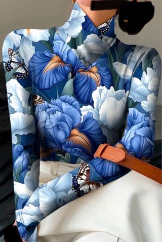 Camiseta manga larga floral mujer