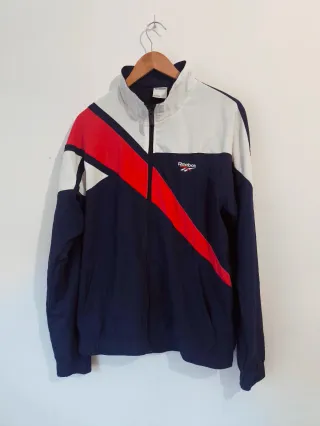 Chaqueta deportiva Reebok azul y roja