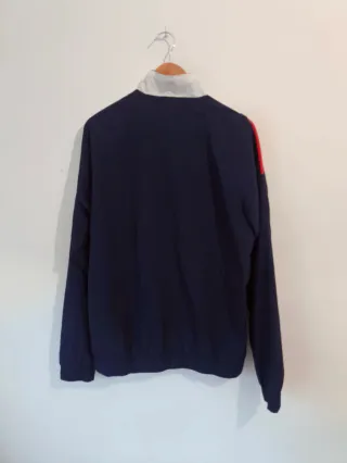 Chaqueta deportiva Reebok azul y roja