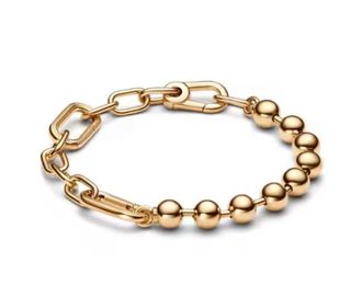 Bracciale modello Pandora con maglie e sfere in oro