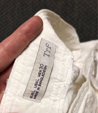 Pantalones blancos anchos con cordón