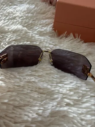 Gafas de sol Miu Miu Marrón y Dorado