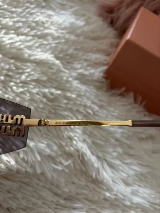 Gafas de sol Miu Miu Marrón y Dorado