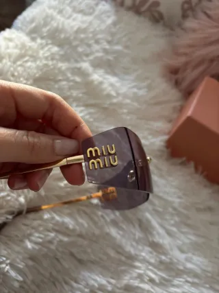 Gafas de sol Miu Miu Marrón y Dorado