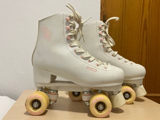 Patines Oxelo blancos y rosas talla 39.