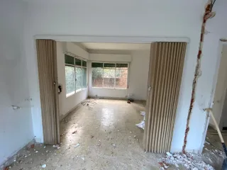 Puerta corredera plegable