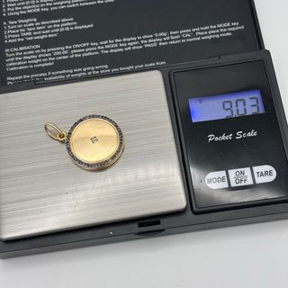 Colgante oro 18kt con zafiros y diamante relicario