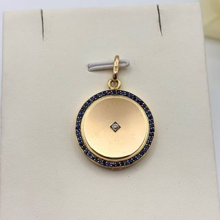 Colgante oro 18kt con zafiros y diamante relicario