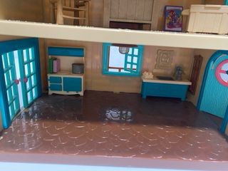 Casa de muñecas con luz