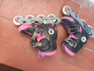 Patines en línea rosas y negros