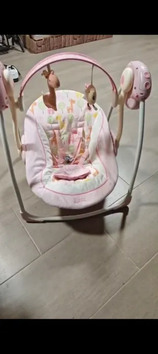 Columpio bebé rosa con peluches