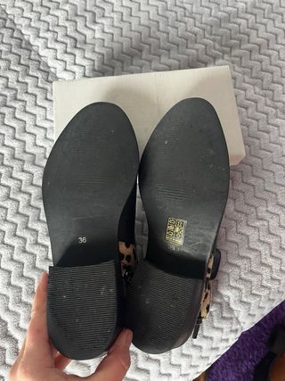 Botines negros con estampado animal T36