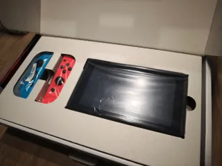 Nintendo Switch + mandos + 9 juegos