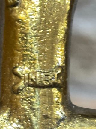 Crocifisso in metallo dorato