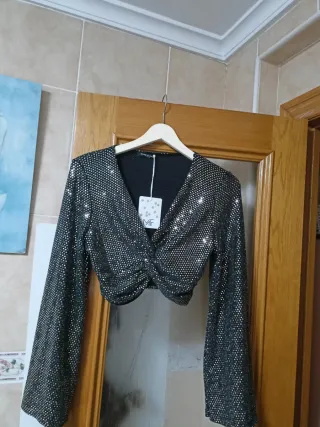 Chaqueta fiesta lentejuelas negra y dorada