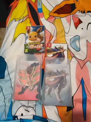 Pokémon Espada,Let's Go Eevee y cajas metálicas.