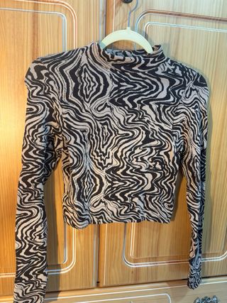 Jersey estampado cebra marrón.
