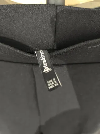 Pantalones negros acampanados