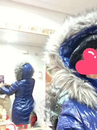 Precioso plumón azul marino