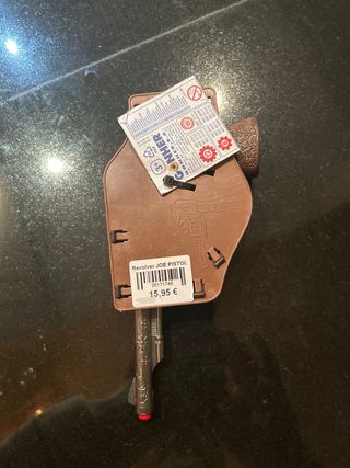 Pistola de juguete con funda