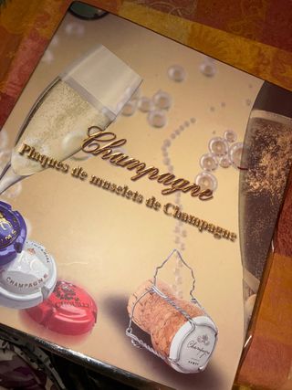 Carpeta para cápsulas de champán