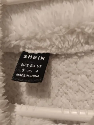 Top peluche blanco cropped